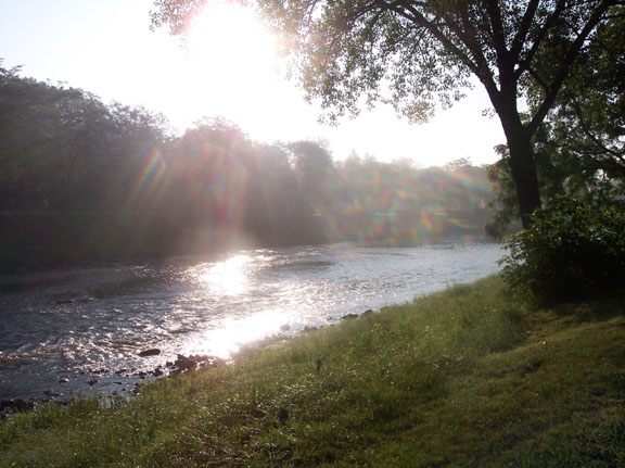 sunrise in prism over the Baraboo River in Baraboo, Wisconsin